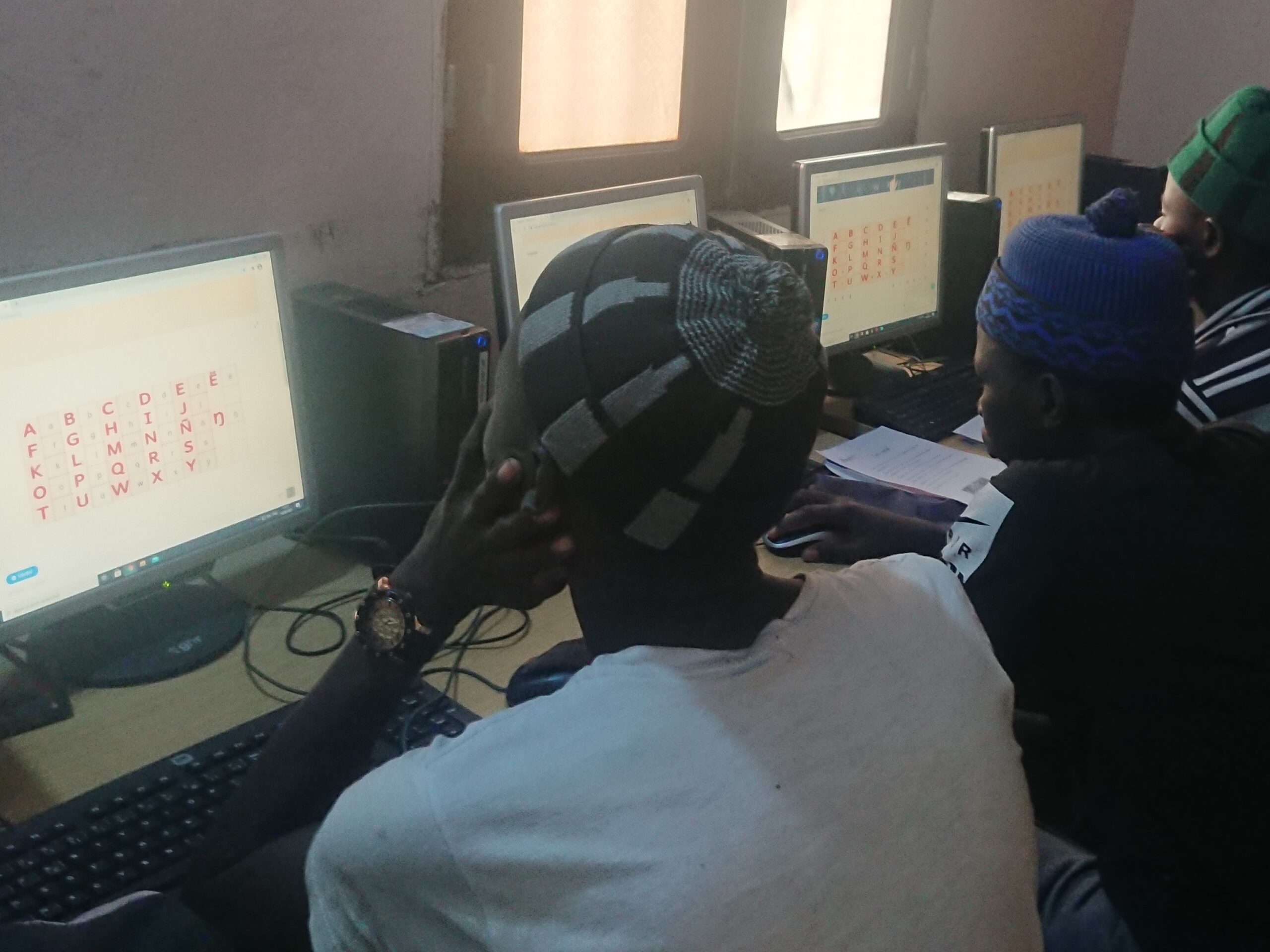 Our Work adult literacy learning the alphabet