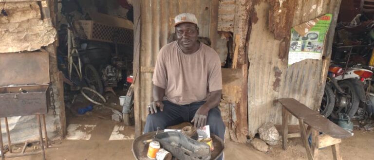makhtar at his motorbike taxi repair workshop (1)